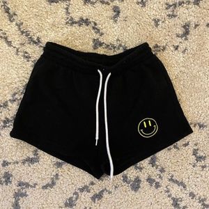 black fleece shorts - size small  - black with embroidered smile